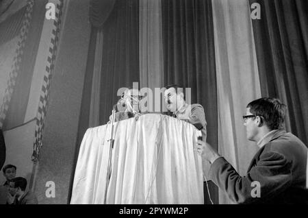 'During the 1966 state parliament election campaign, Günter Grass appears at a discussion event organized by the Liberaler Studentenbund Deutschlands (LSD) at the Löwenbräukeller in Munich. The event is entitled ''Are There Reasons to Vote NDP? [automated translation]' Stock Photo