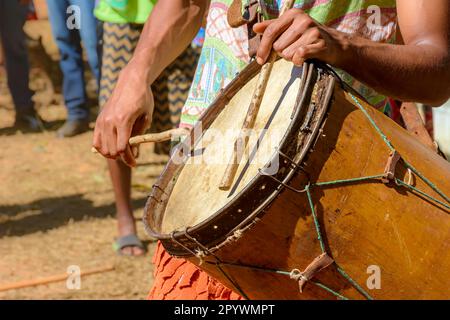 Ethnic and rustic handmade drums in a religious festival that originated in the mixing of the culture of enslaved Africans with European colonizers Stock Photo