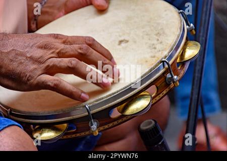 Tambourine being played by a ritimist during a samba performance in Rio de Janeiro, Brazil, Rio de Janeiro, Rio de Janeiro, Brasil Stock Photo