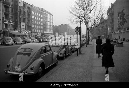 'Since 1953, the VW Beetle has been built with the oval rear window. Several Volkswagen Beetles with the nickname ''Ovalie'' stand in a street of Berlin. Undated photo, around 1953. ' Stock Photo