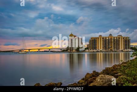 Cloudy sunset over Goldern Gate Point and the John Ringling Causeway Bridge over Sarasota Bay in Sarasota Florida USA Stock Photo