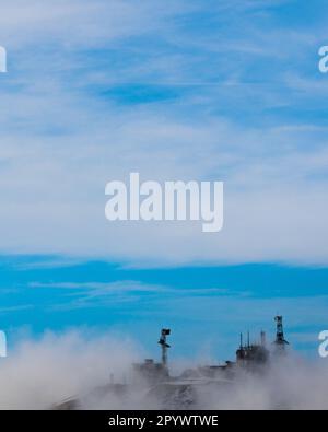 Mystic antennas emerging from the fog on Monte Terminillo. Stock Photo