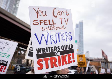 Queens, New York, USA. 4th May, 2023. Writers Guild of America members march on a picket line in front of Silvercup Studios. After contract negotiations failed, thousands of unionized writers voted unanimously to strike, bringing television production to a halt, and initiating the first walkout in 15 years. (Credit Image: © Michaal Nigro/Pacific Press via ZUMA Press Wire) EDITORIAL USAGE ONLY! Not for Commercial USAGE! Stock Photo