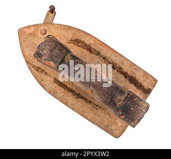 top view of old charcoal iron with wooden handle cut out on white background Stock Photo
