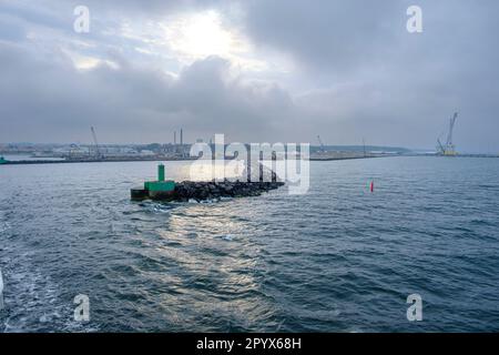 Entrance to the ferry port of Sassnitz Mukran with lighthouse and pier light, Sassnitz, Mecklenburg-Western Pomerania, Rugen Island, Germany, Europe. Stock Photo