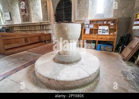 The font in St Mary's Church in Selborne village, Hampshire, England, UK Stock Photo