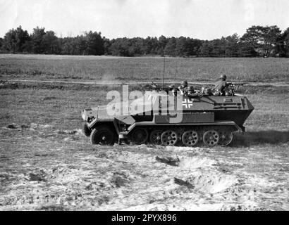 Wehrmacht armored personnel carrier during a demonstration, probably at a military training area in Germany. Photo: Schwahn [automated translation] Stock Photo