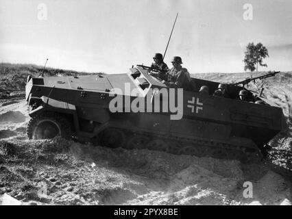 Wehrmacht armored personnel carrier during a demonstration, probably at a military training area in Germany. Photo: Schwahn [automated translation] Stock Photo