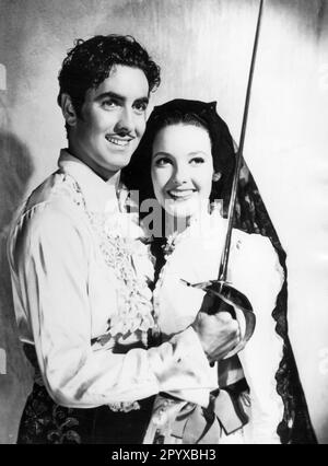Tyrone Power as Don Diego with saber and Linda Darnell as Lolita in the movie 'Under the Sign of Zorro' . [automated translation] Stock Photo