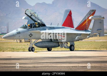 Two Naval Aviators return after performing a demonstration of the EA-18G Growler at the 2023 Thunder and Lightning Over Arizona airshow in Tucson, Ari Stock Photo