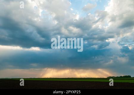 Background from the cloudy sky with sun rays Stock Photo - Alamy