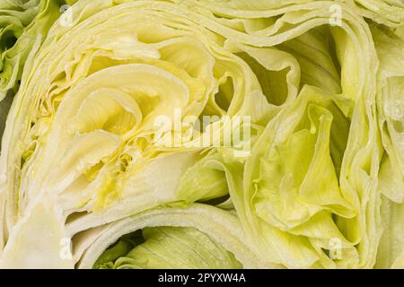 Full frame intersection shot of green fresh iceberg lettuce. Stock Photo