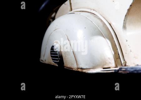 detailed view of motor scooter model on black table with black background Stock Photo