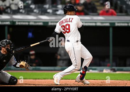 Cleveland Guardians' Oscar Gonzalez bats during the third inning of a  spring training baseball game against the Los Angeles Dodgers Wednesday,  March 23, 2022, in Glendale, Ariz. (AP Photo/Charlie Riedel Stock Photo 