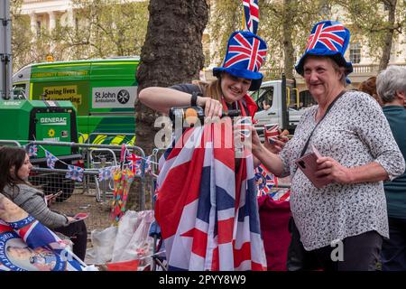 London UK, 5th May 2023. Less than a day away from the Coronation on The Mall people enjoying themselves and celebrating the King Charles III. Credit: Rena Pearl/Alamy Live News Stock Photo