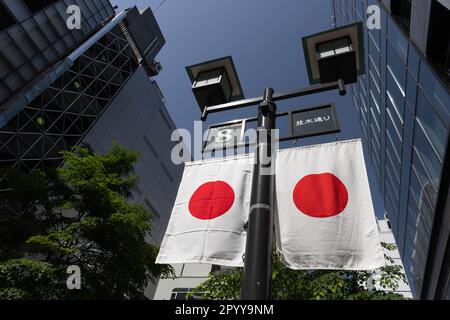 Japanese flags decorate a street in Ginza, Tokyo Stock Photo - Alamy