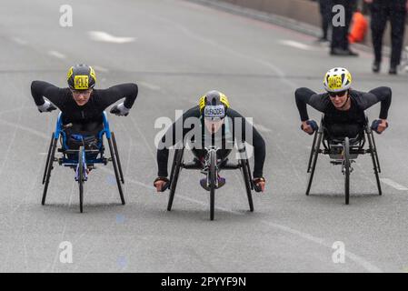 Tatyana McFadden competing in the TCS London Marathon 2023 passing through Tower Hill, London, UK. Wheelchair athlete. Para athlete. Stock Photo