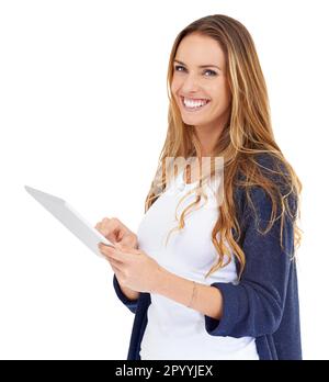 Getting to grips with tablet technology. A beautiful young woman holding a tablet isolated on white. Stock Photo