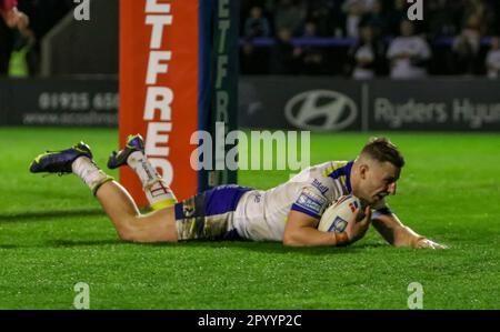 Warrington, Cheshire, England 5th May 2023. Warrington's George Williams scoring a try, during Warrington Wolves V Wakefield Trinity , at the Halliwell Jones Stadium, in the Betfred Super League Stock Photo