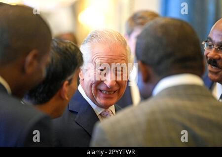 London, UK. 05th May, 2023. King Charles III speaks to guests during a reception at Buckingham Palace for overseas guests attending the coronation of King Charles III on May 5, 2023 in London, England. Photo by The Royal Family/UPI Credit: UPI/Alamy Live News Stock Photo