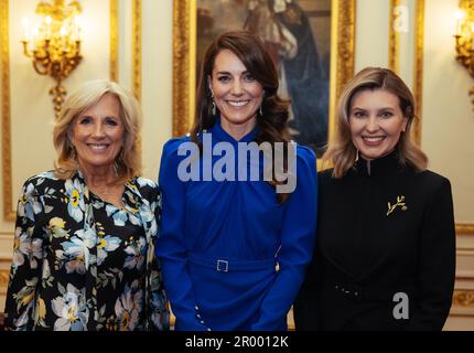 London, UK. 05th May, 2023. Catherine, Princess of Wales (C), US First Lady, Jill Biden (L) and First Lady of Ukraine, Olena Zelenska (R) pose for a group photo during a reception at Buckingham Palace for overseas guests attending the coronation of King Charles III on May 5, 2023 in London, England. Photo by The Royal Family /UPI Credit: UPI/Alamy Live News Stock Photo