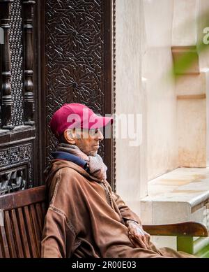 Old Moroccan Man Sitting On The Street ,marrakech,morocco Stock Photo 