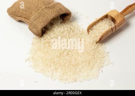 white background - spilled rice grains Stock Photo - Alamy