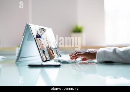 Virtual Business Presentation Or Videoconferencing On Hybrid Screen Stock Photo