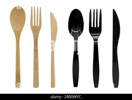 Cutlery of wood and plastic and knife, disposable fork, spoon and knife. Isolated on white background. Stock Photo