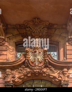 Sandstone city coat of arms above the entrance of a house in Kaiserstrasse, Frankfurt, Germany Stock Photo