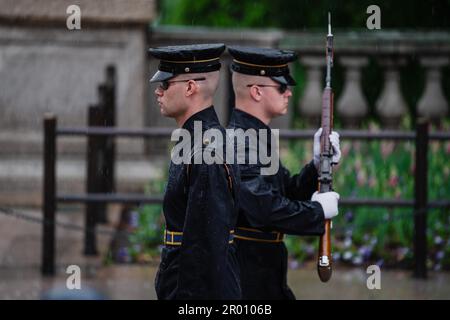 Arlington, Virginia, USA. 22nd Apr, 2023. Army Staff Sgt. Taylor Uhler, left, and Spc. Wyatt Stearns, tomb sentinels assigned to the 3rd Infantry Regiment, known as The Old Guard cross paths during a changing of the guard ceremony at the Tomb of the Unknown Soldier in Arlington, Va., April 22, 2023. Sentinels guard the Tomb at all hours of the day and in any weather condition. (Credit Image: © U.S. Army/ZUMA Press Wire Service/ZUMAprilESS.com) EDITORIAL USAGE ONLY! Not for Commercial USAGE! Stock Photo