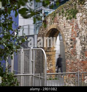 Abbey well and the Blade office complex that are part of the Ruins of Reading Abbey, Reading, Berkshire. Stock Photo