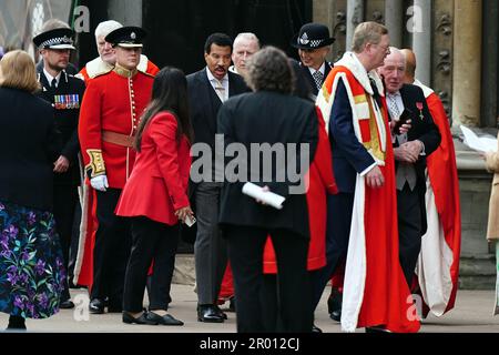Lionel Richie (centre) arriving ahead of the coronation ceremony of King Charles III and Queen Camilla at Westminster Abbey, London. Picture date: Saturday May 6, 2023. Stock Photo
