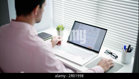 E Invoice Business Management. Accountant Using Electronic Invoice Stock Photo