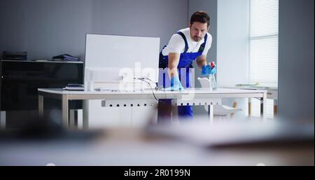 Professional Workplace Janitor Service. Office Desk Cleaning Stock Photo