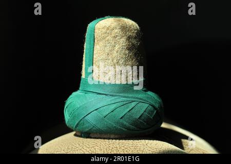 The hat worn by the Mevlevi dervishes. Hat made of brown felt for Mevlevi dervishes. This hat is called a sikke. Stock Photo