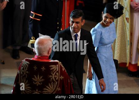 Prime Minister Rishi Sunak and his wife Akshata Murty arriving ahead of the coronation of King Charles III and Queen Camilla at Westminster Abbey, London. Picture date: Saturday May 6, 2023. Stock Photo