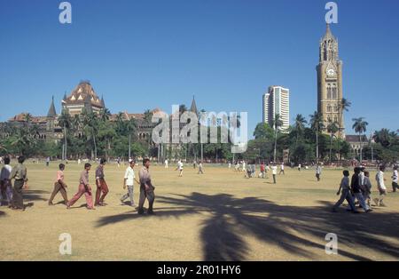 the architecture of the Rajabai Clock Tower of the Universita of Munmbai in Colaba in the city centre of Mumbai in India.  India, Mumbai, March, 1998 Stock Photo