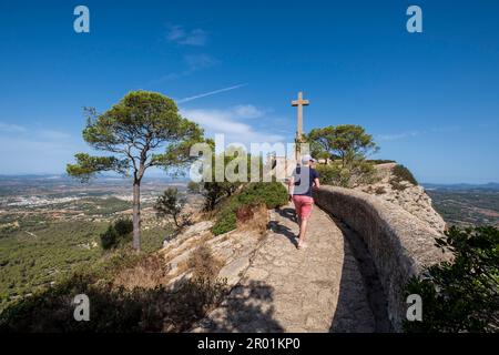 family ascending to picot cross, Sanctuary of the Mare de Déu de Sant Salvador, XIV century., Felanitx, Majorca, Balearic Islands, Spain. Stock Photo