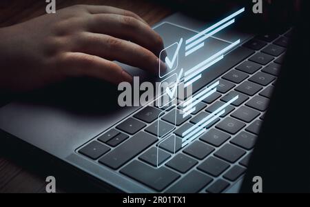 Woman use laptop marking check boxes. Successful completion of business tasks. Digital marketing strategy. Business goals. Online approve. Stock Photo
