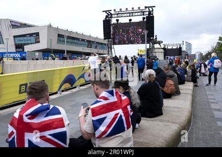 LIVERPOOL - The coronation of Charles can be seen on large screens in the Eurovision Village (fan zone of the Eurovision song contest). Charles has been officially king since the death of his mother Elizabeth, but the coronation was still a long time coming. ANP SANDER KONING netherlands out - belgium out Credit: ANP/Alamy Live News Stock Photo