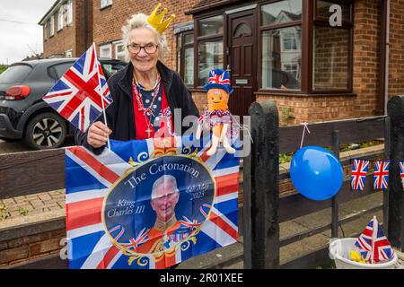 Coventry, West Midlands, UK. 6th May, 2023. People around the country came out to celebrate the coronation of King Charles III today. Agnes Gibbins from Radford, Coventry decorated the front of her house. Credit: AG News/Alamy Live News Stock Photo