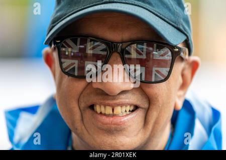 Coventry, West Midlands, UK. 6th May, 2023. People around the country came out to celebrate the coronation of King Charles III today. Raj Gosai gets into the spirit of the day in Broadgate, Coventry City Centre. Credit: AG News/Alamy Live News Stock Photo