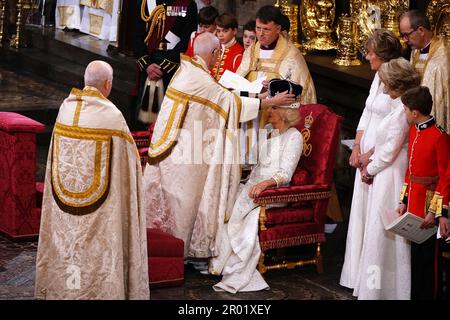 Queen Camilla is crowned with Queen Mary's Crown by The Archbishop of Canterbury the Most Reverend Justin Welby during his coronation ceremony in Westminster Abbey, London. Picture date: Saturday May 6, 2023. Stock Photo