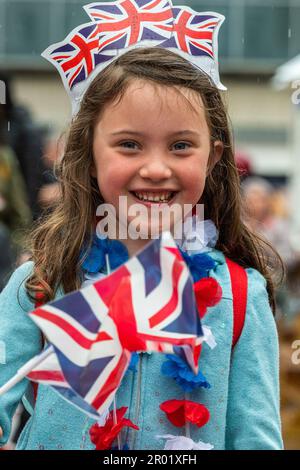 Coventry, West Midlands, UK. 6th May, 2023. People around the country came out to celebrate the coronation of King Charles III today. Matilda Beere gets into the spirit of the day in Broadgate, Coventry City Centre. Credit: AG News/Alamy Live News Stock Photo