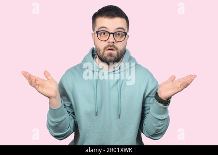 surprised young man in glasses Stock Photo