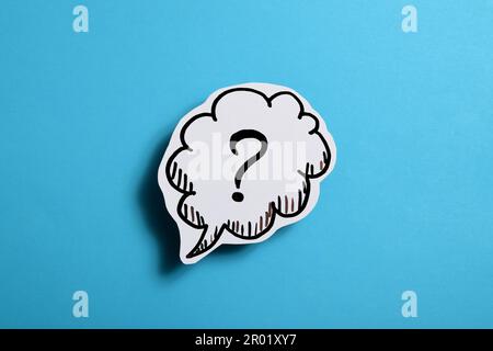 drawn question mark on a blue background Stock Photo