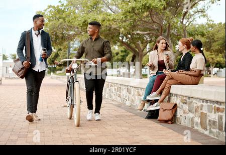 The next generation of entrepreneurs. a group of young businesspeople during their coffee break in the city. Stock Photo
