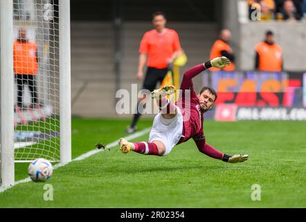 Dresden, Germany. 06th May, 2023. Soccer: 3. league, SG Dynamo Dresden - SV Wehen Wiesbaden, 35. matchday, Rudolf-Harbig-Stadion. Dynamo goalkeeper Stefan Drljaca is unable to save a penalty kick to make it 1:1. Credit: Robert Michael/dpa/Alamy Live News Stock Photo