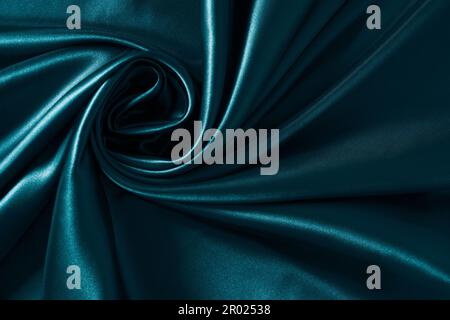 Background blue twisted silk fabric,abstract texture satin fabric Stock Photo